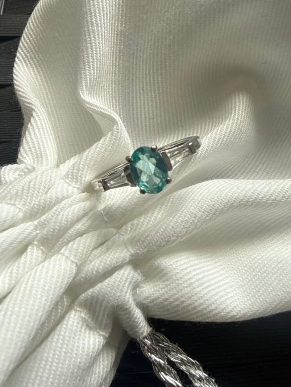 Blue-green oval ring